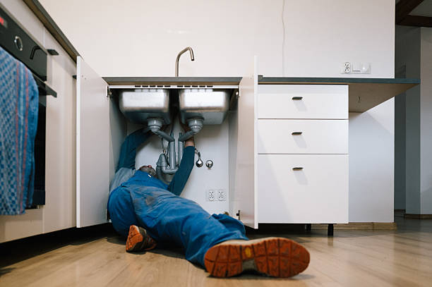 Professional Drain Cleaning technician working in Battletown, KY